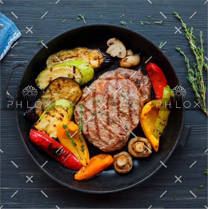 demo-attachment-225-grilled-beef-steak-on-dark-wooden-table-P4NLM25